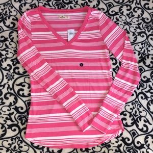 pink and white stripped long sleeved shirt